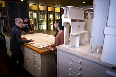 Students working with a faculty member