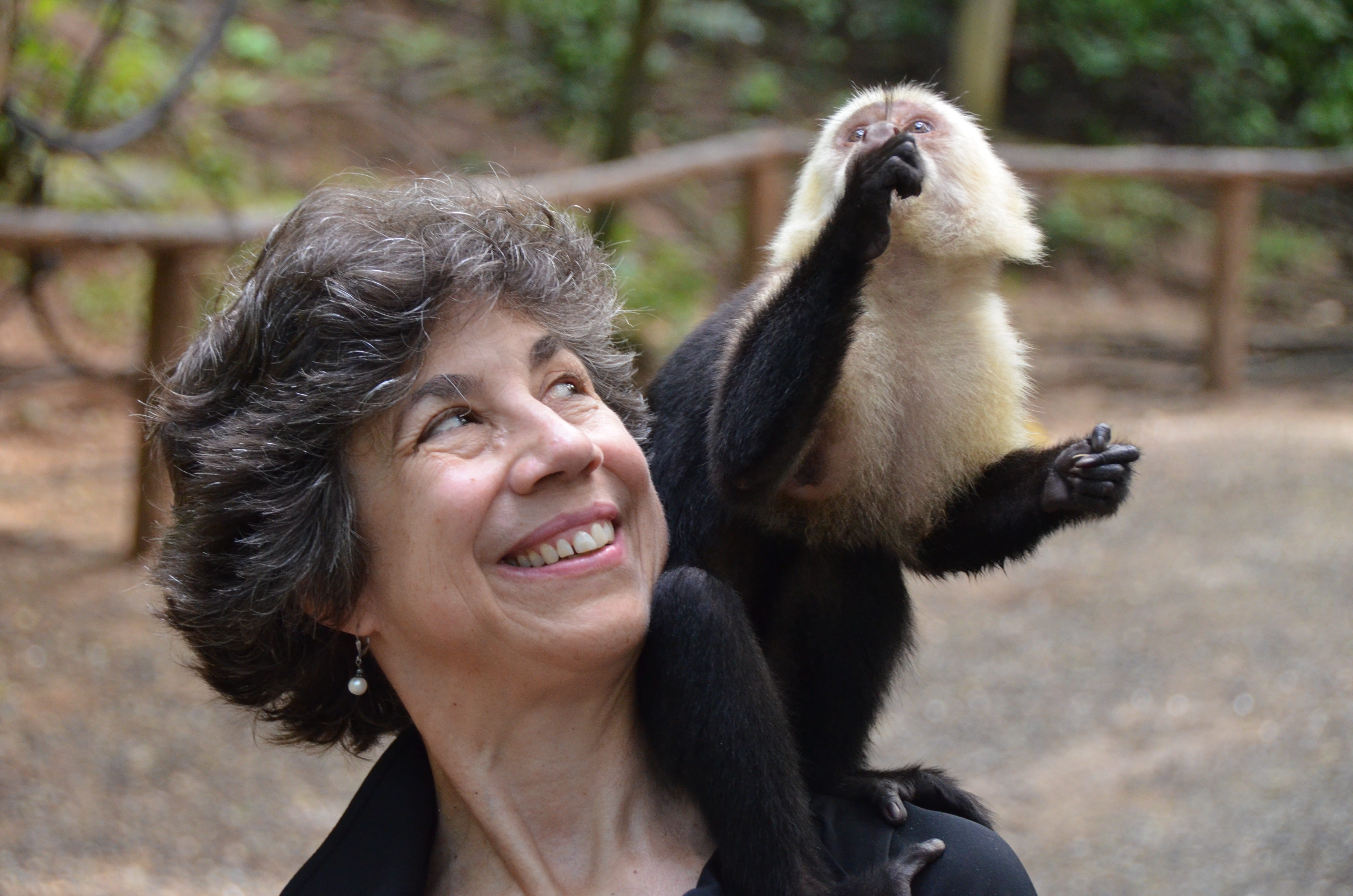 Elsa Limbach with a monkey on her shoulder