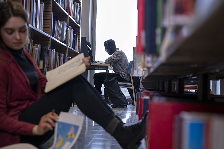 Photo of students studying in the library