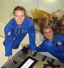 Ulrike (left) encounters microgravity in a parabolic flight during her training at University of Bonn.