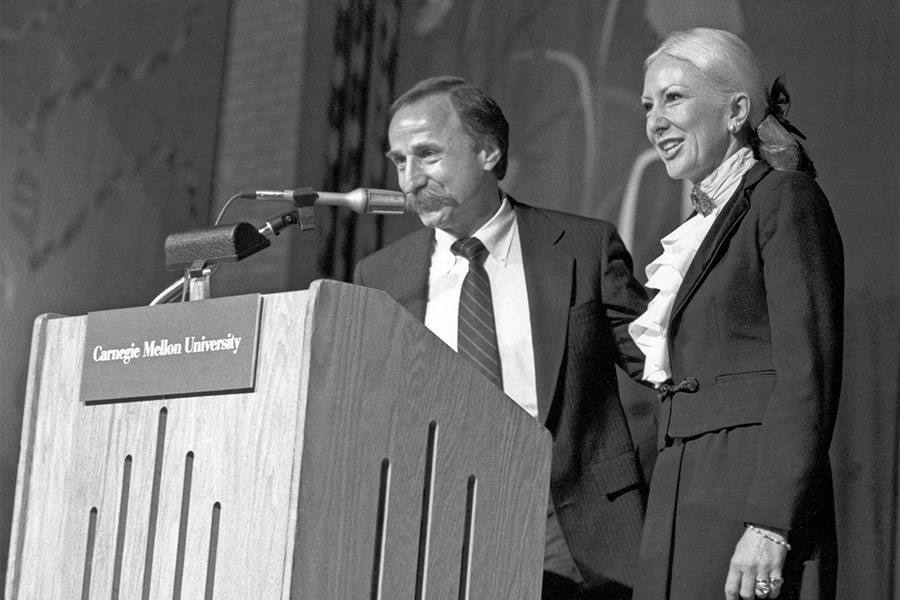 the Mehrabians at the podium during a CMU event