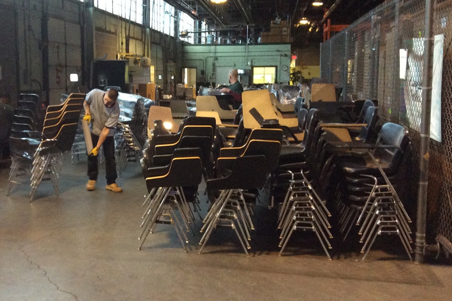 Chairs are prepared for shipping.