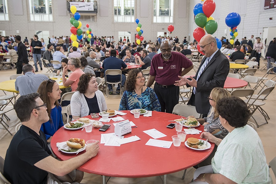 President Jahanian greets staff