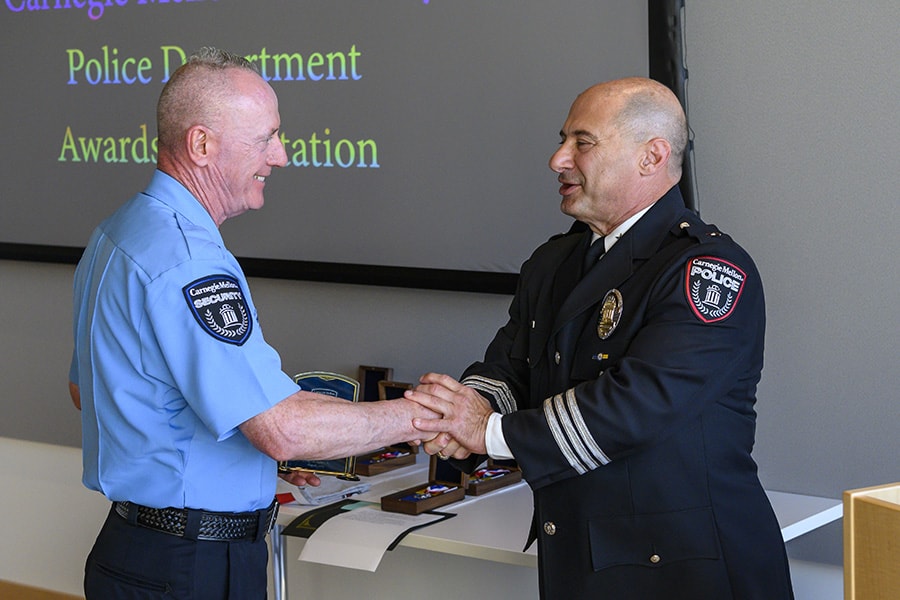 Image of Jim Moran shaking hands with Chief Ogden
