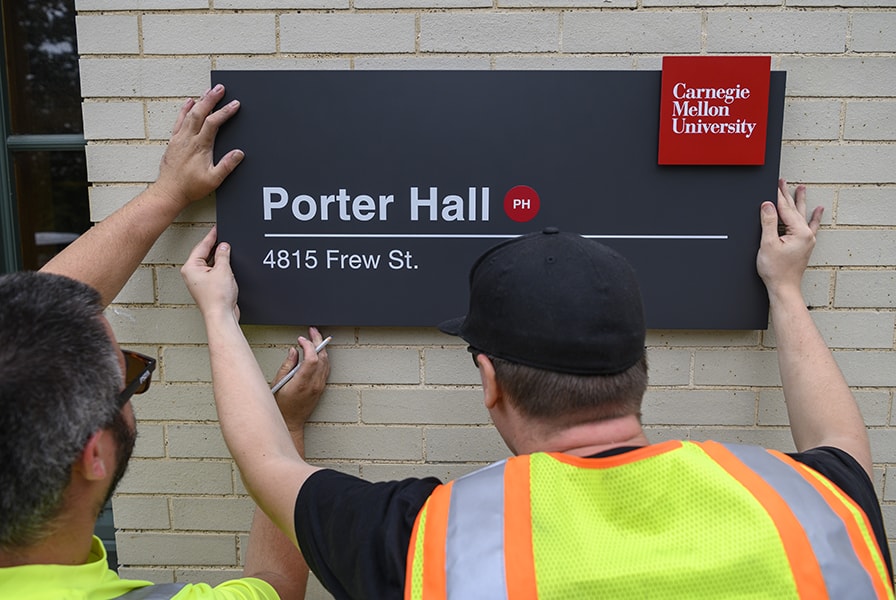 image of a new building sign on campus