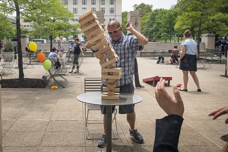 image of person playing Jenga