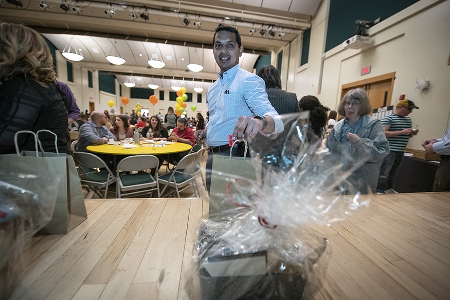 image of staff person entering the raffle