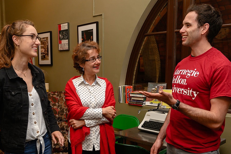image of teachers and students conversing