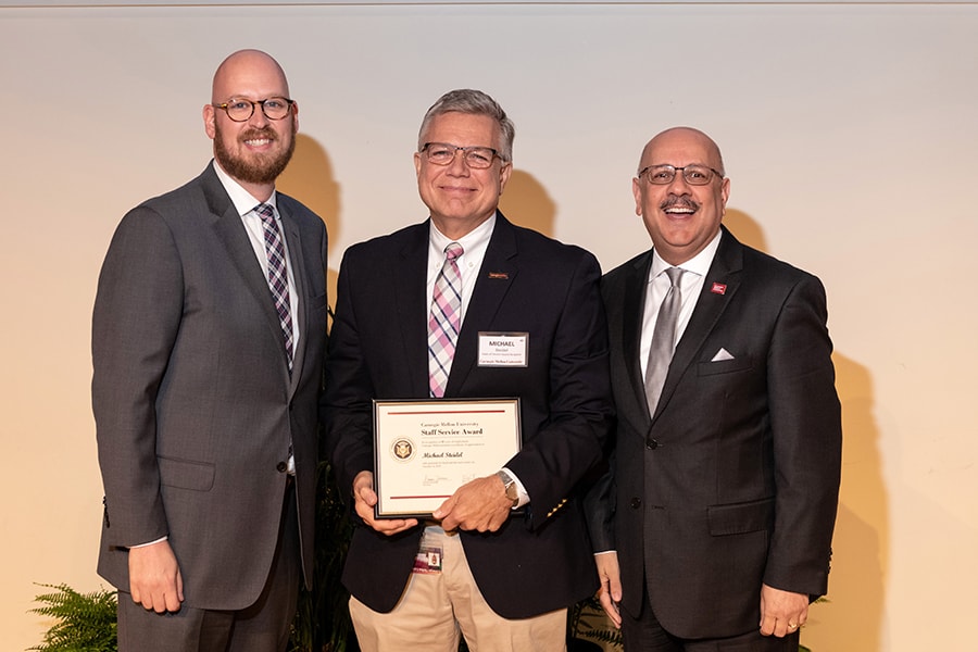 image of MIchael Steidel with Staff Council Chair Bryan Koval and President Farnam Jahanian