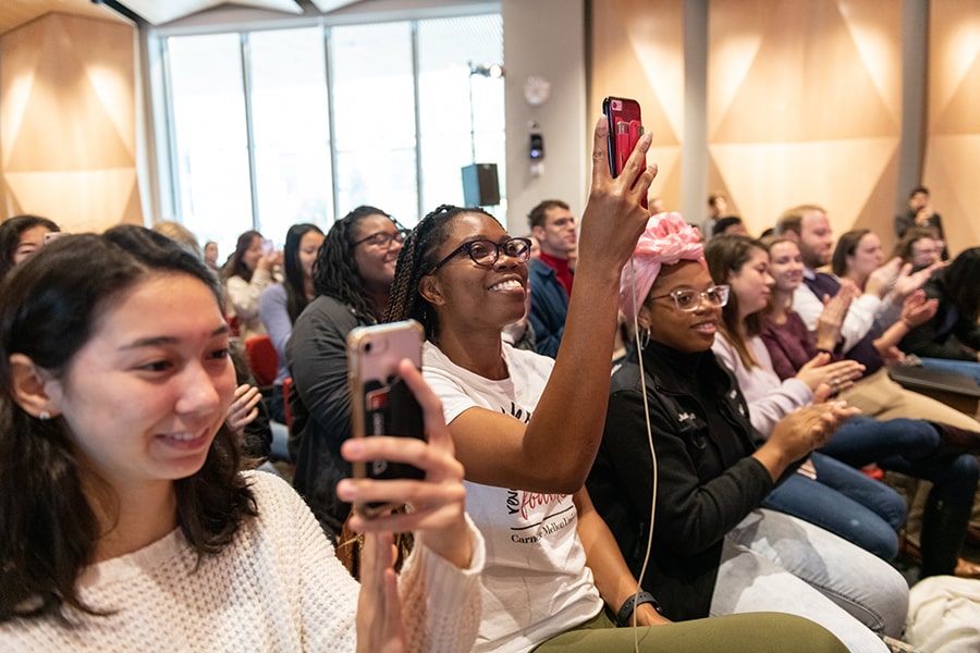 image of students taking cellphone pictures of Renee Elise Goldsberry