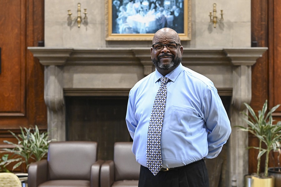 Louis McCauley standing inside residence hall