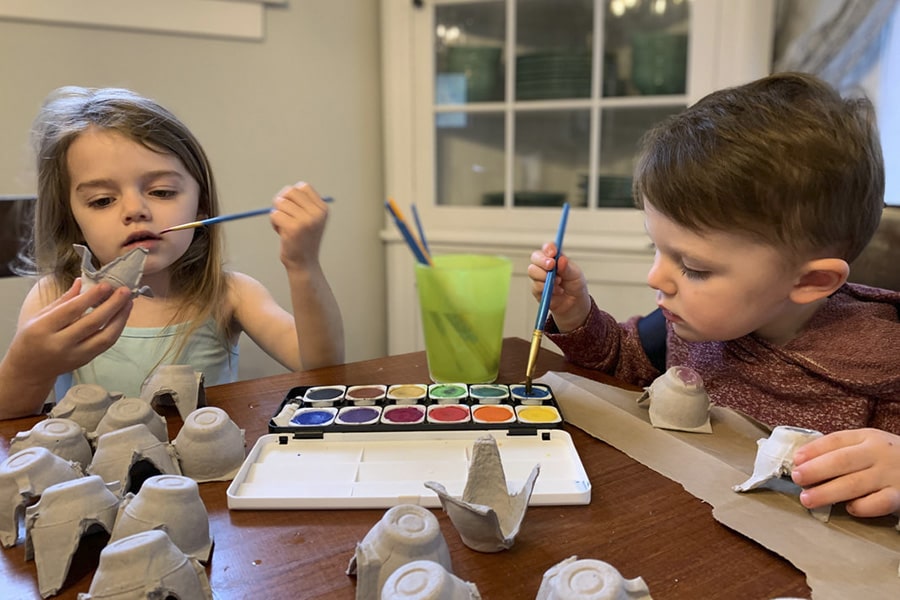 pre-schoolers painting at home