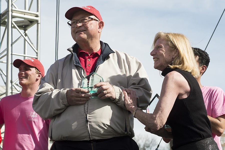 Anne Witchner and Tom Wood receive Lifetime Chairman Choice Awards for their longstanding impact on the Sweepstakes Races.