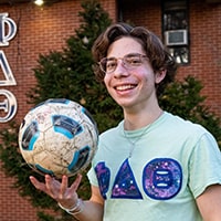 Alex Sahinidis holding a soccer ball
