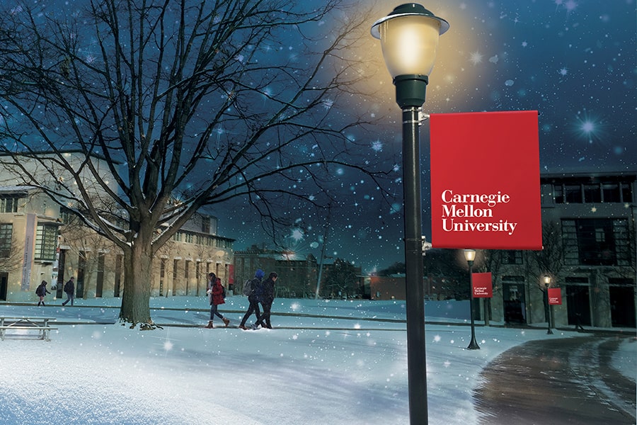 snow flurries on campus at dusk