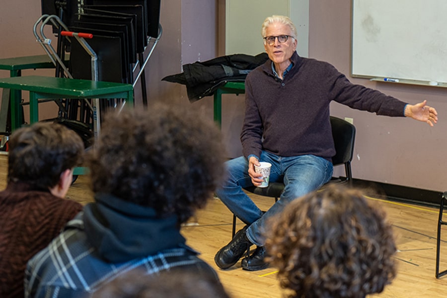 image of Ted Danson speaking with students in a classroom