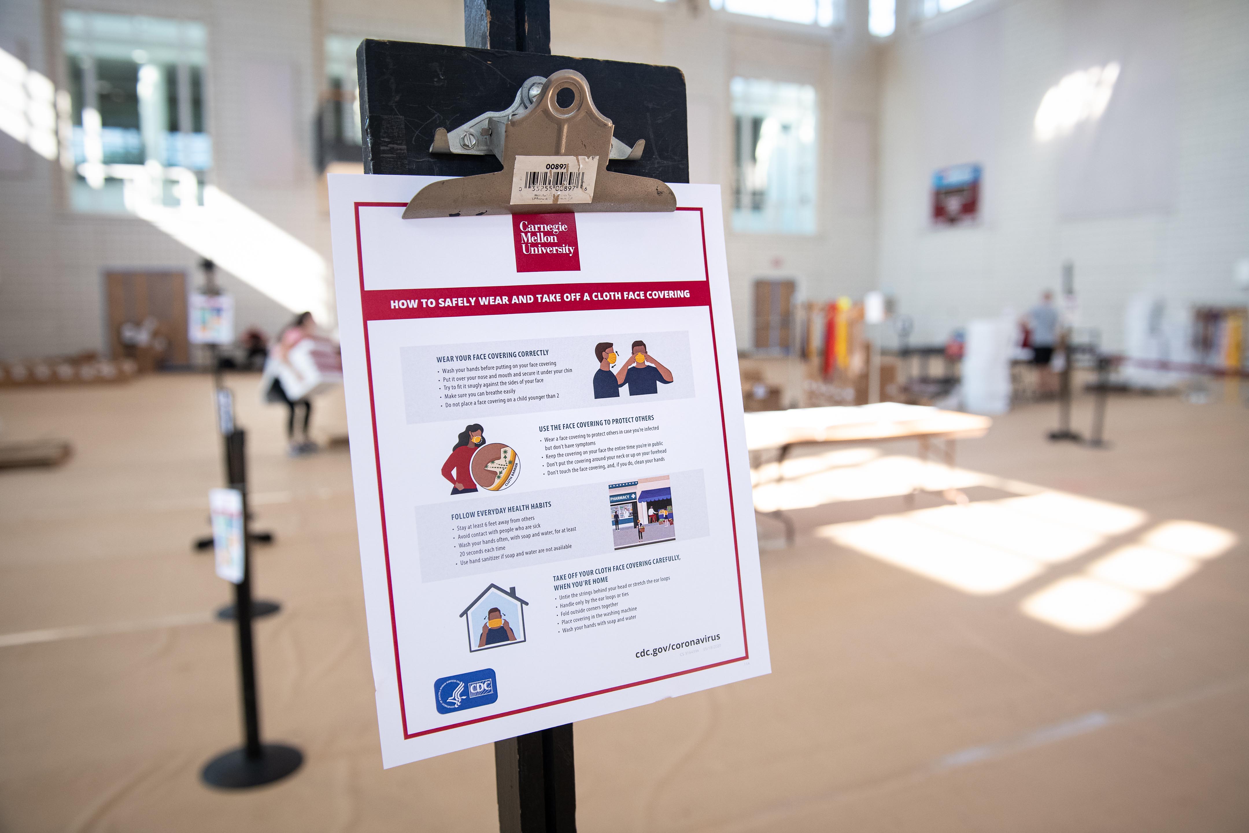 Image of signage for health and safety inside Wiegand Gym