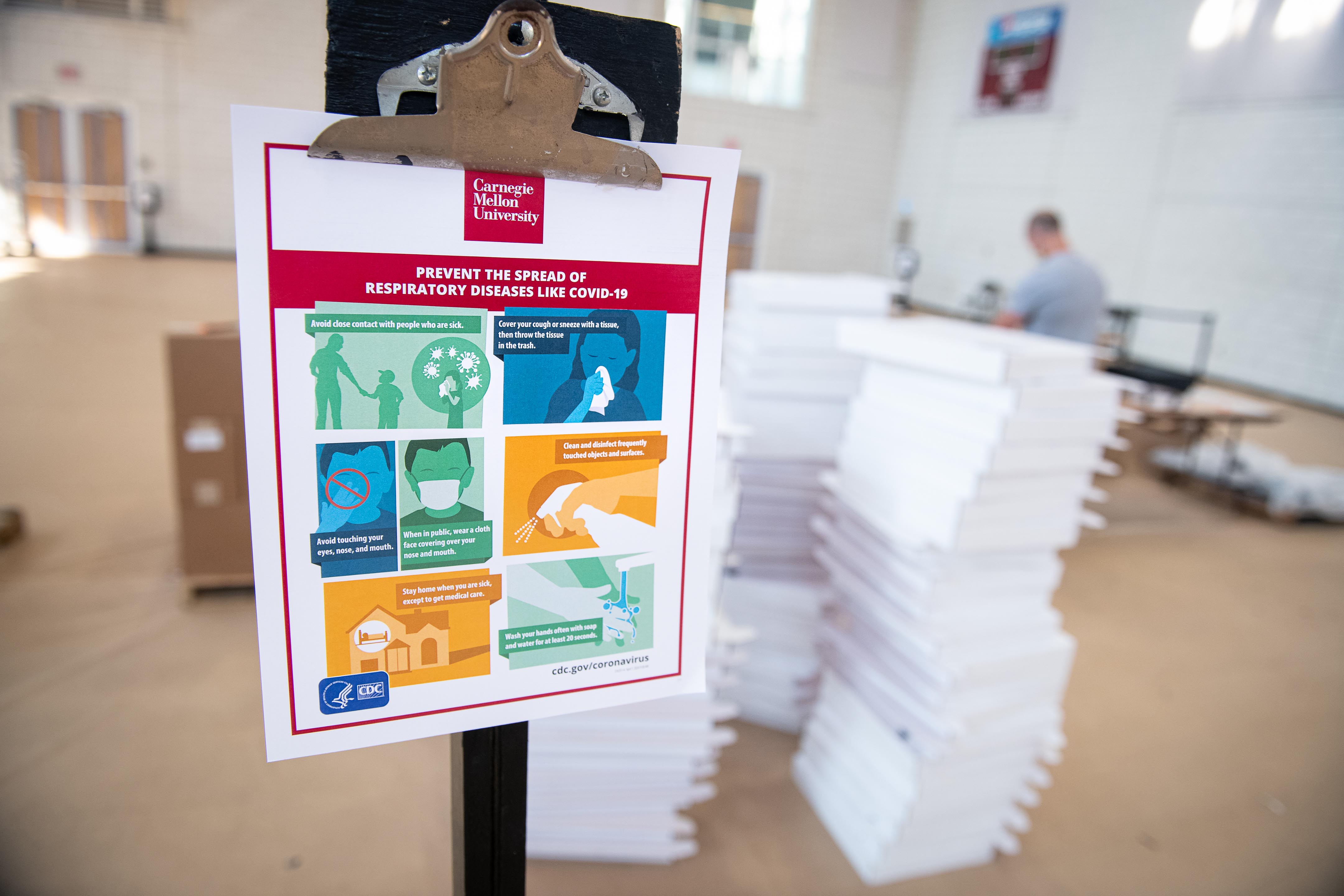 Image of health and safety signage inside Wiegand Gym