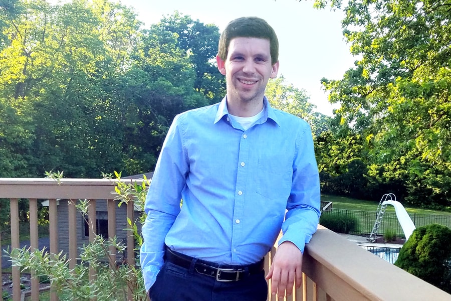 portrait of Josh Gyory on his backyard deck in Allentown, Pa. 