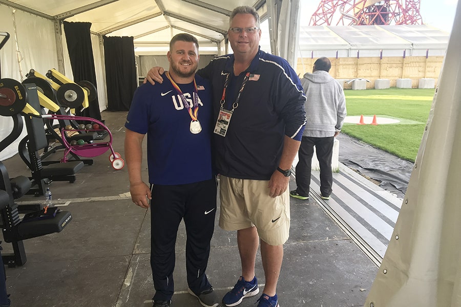 Gary Aldrich poses with an Olympic athlete