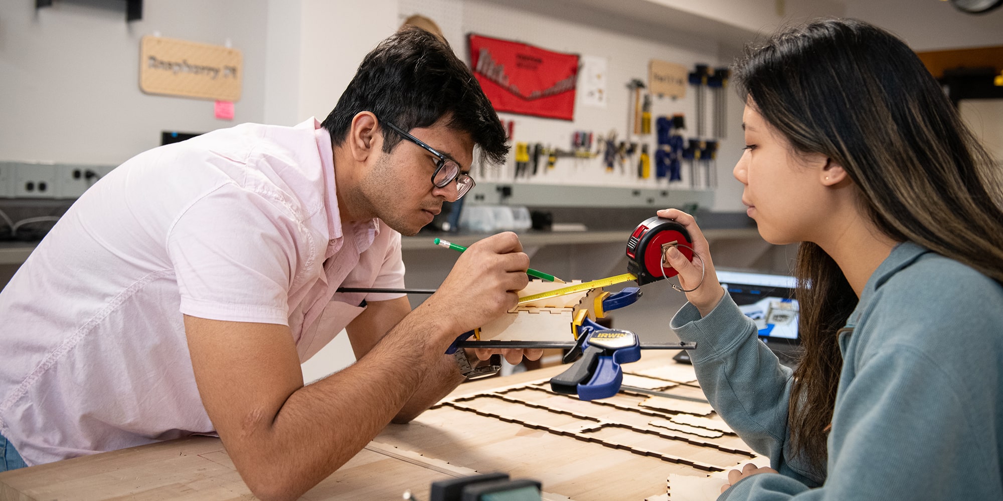 image of sudents working at the Morewood MakerSpace