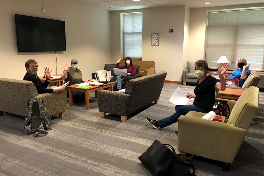 Image of volunteers waiting to pack for Stever residents