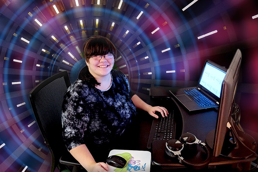 Rebecca Rapp at her computer with a virtual background