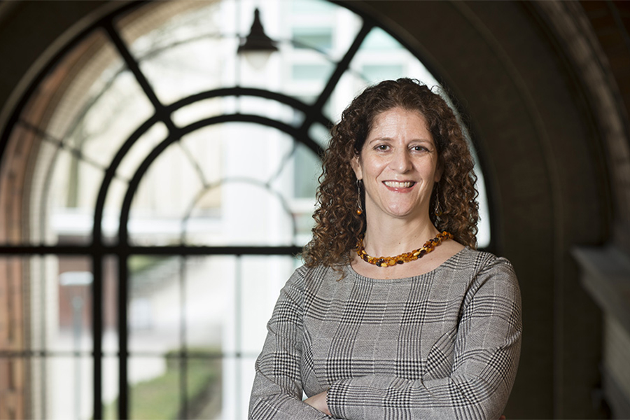 portrait of Michal Friedman standing in Baker Hall