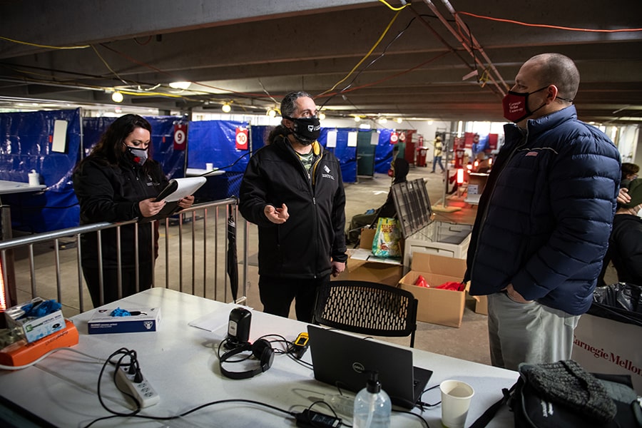 the three managers in the East Campus Garage testing site