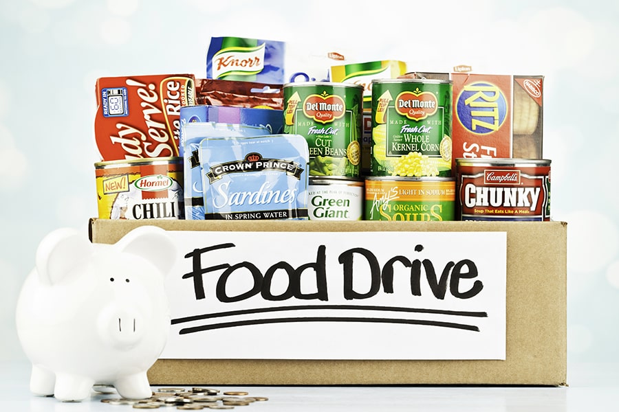 food drive box and piggy bank with coins