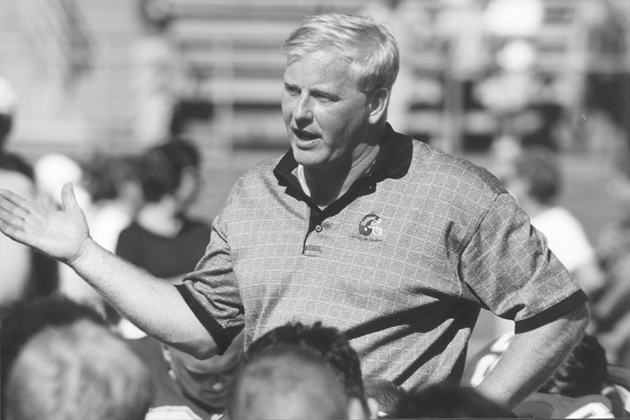 Rich Lackner talks to his team in 1999