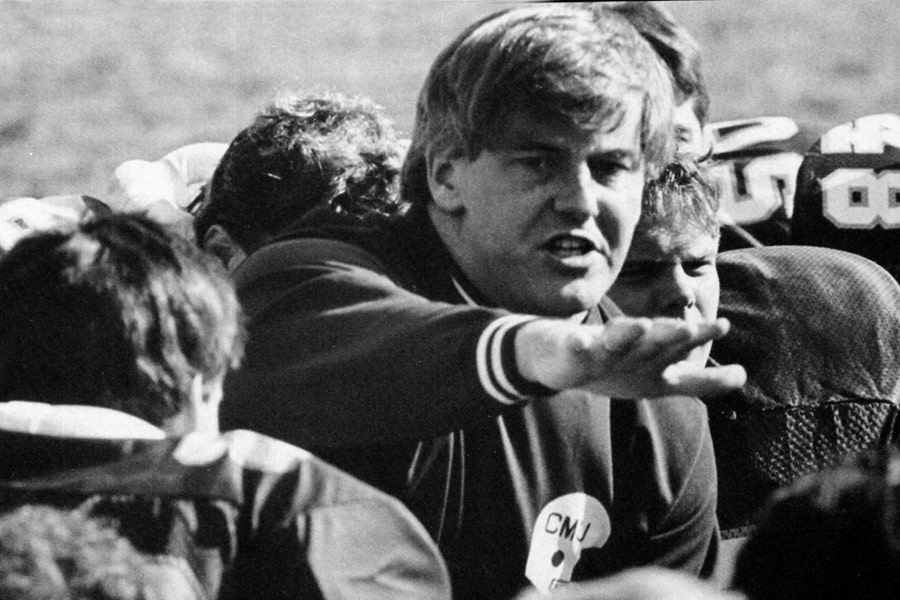 Lackner as a young head coach talks to his team