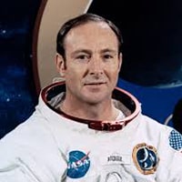 portrait of Edgar Mitchell in his astronaut's uniform