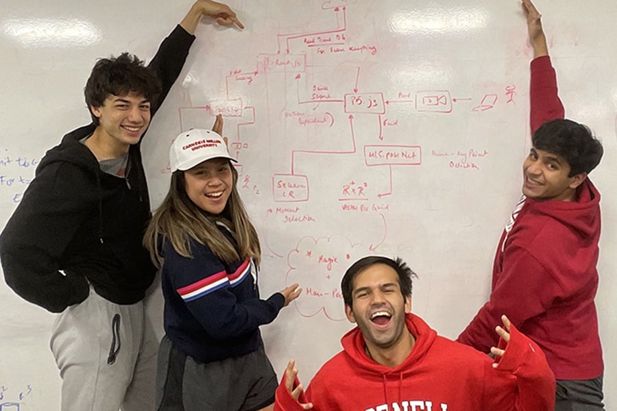 students celebrate winning the Cornell hackathon with their dance app