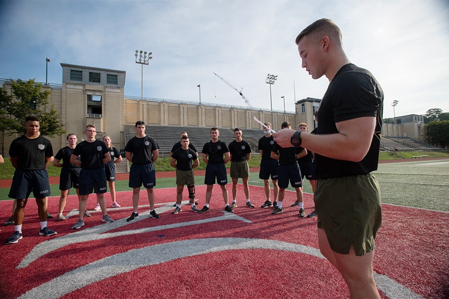 Midshipmen pause to listen to one of many stories of heroic acts on 9/11