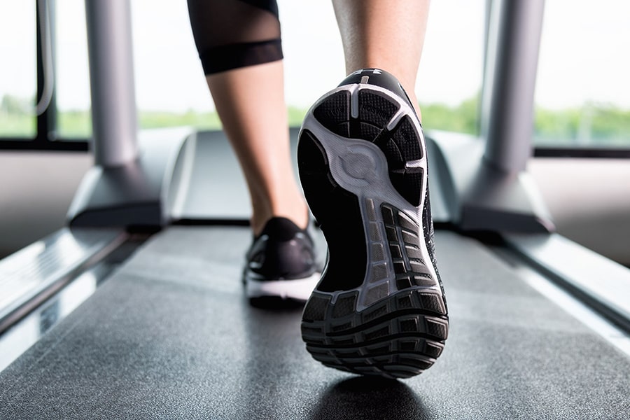 feet on a treadmill