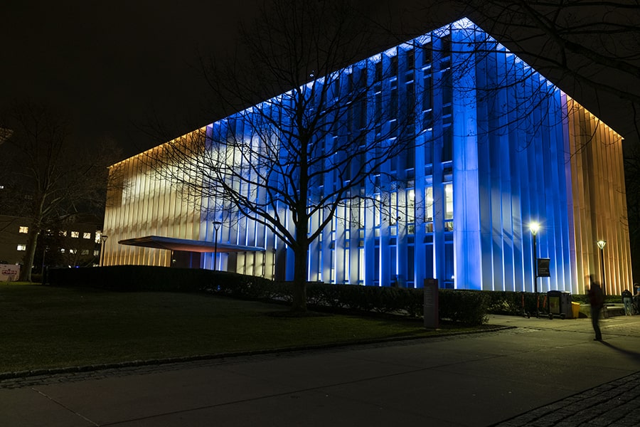 Hunt Library lit in blue and yellow