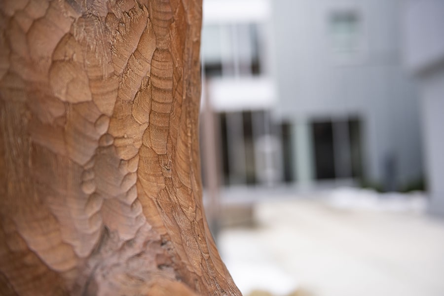 a closeup of the inverted dancer sculpture