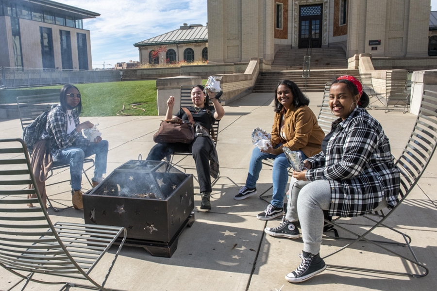 students around a fire pit
