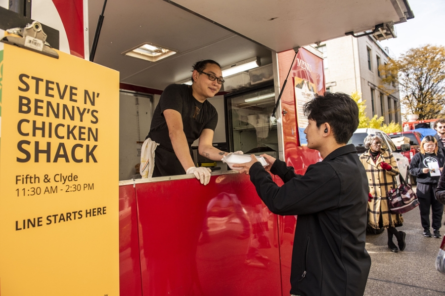 a student at a food truck