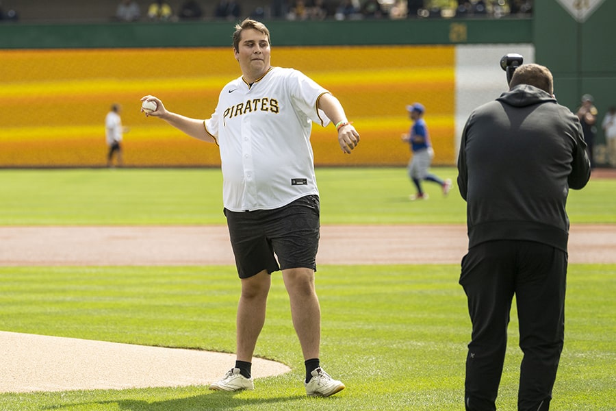 Alex White throws the first pitch