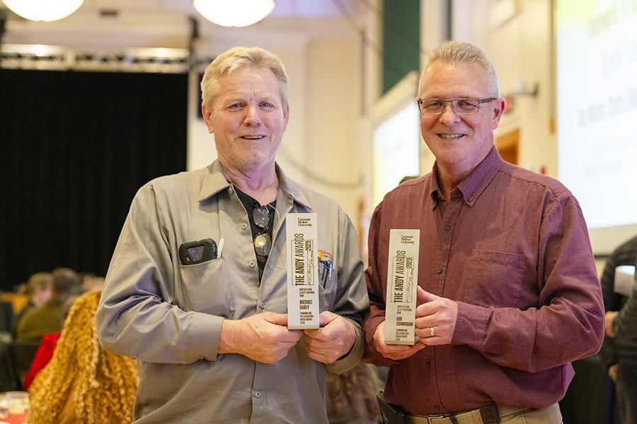 Andy Award winners Michael Dadey and Ron Cunningham of the Winter Storm Elliott Response Crew stand with their awards.