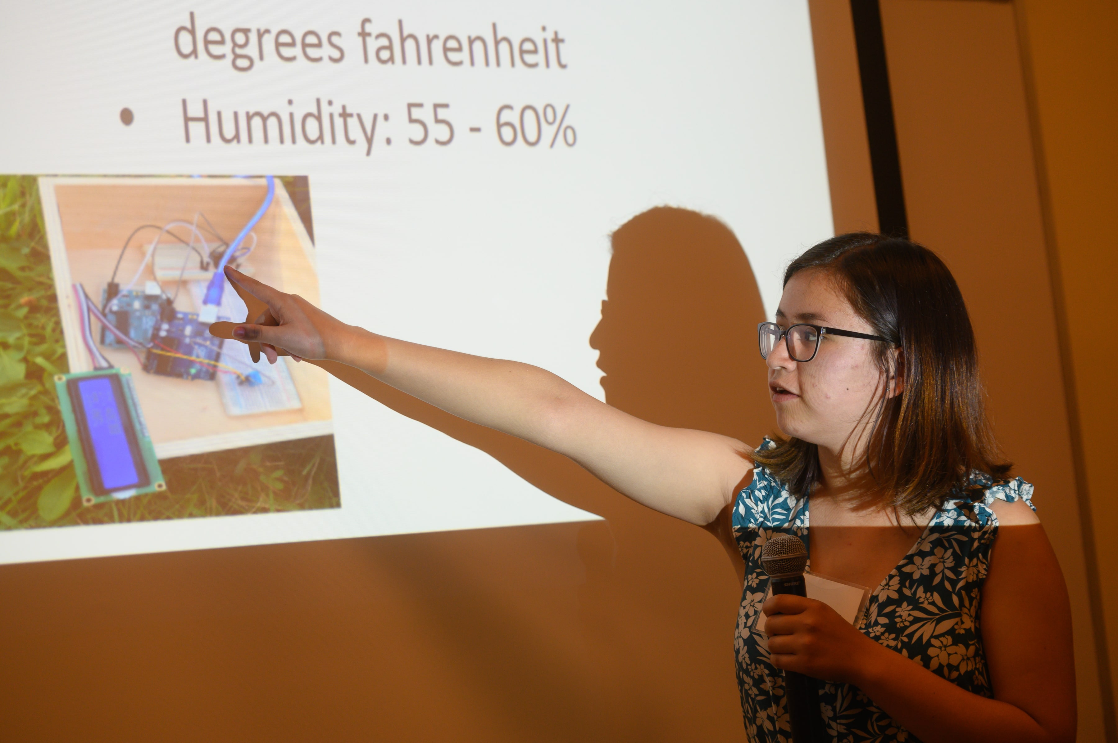 A SAMS student giving a power point presentation