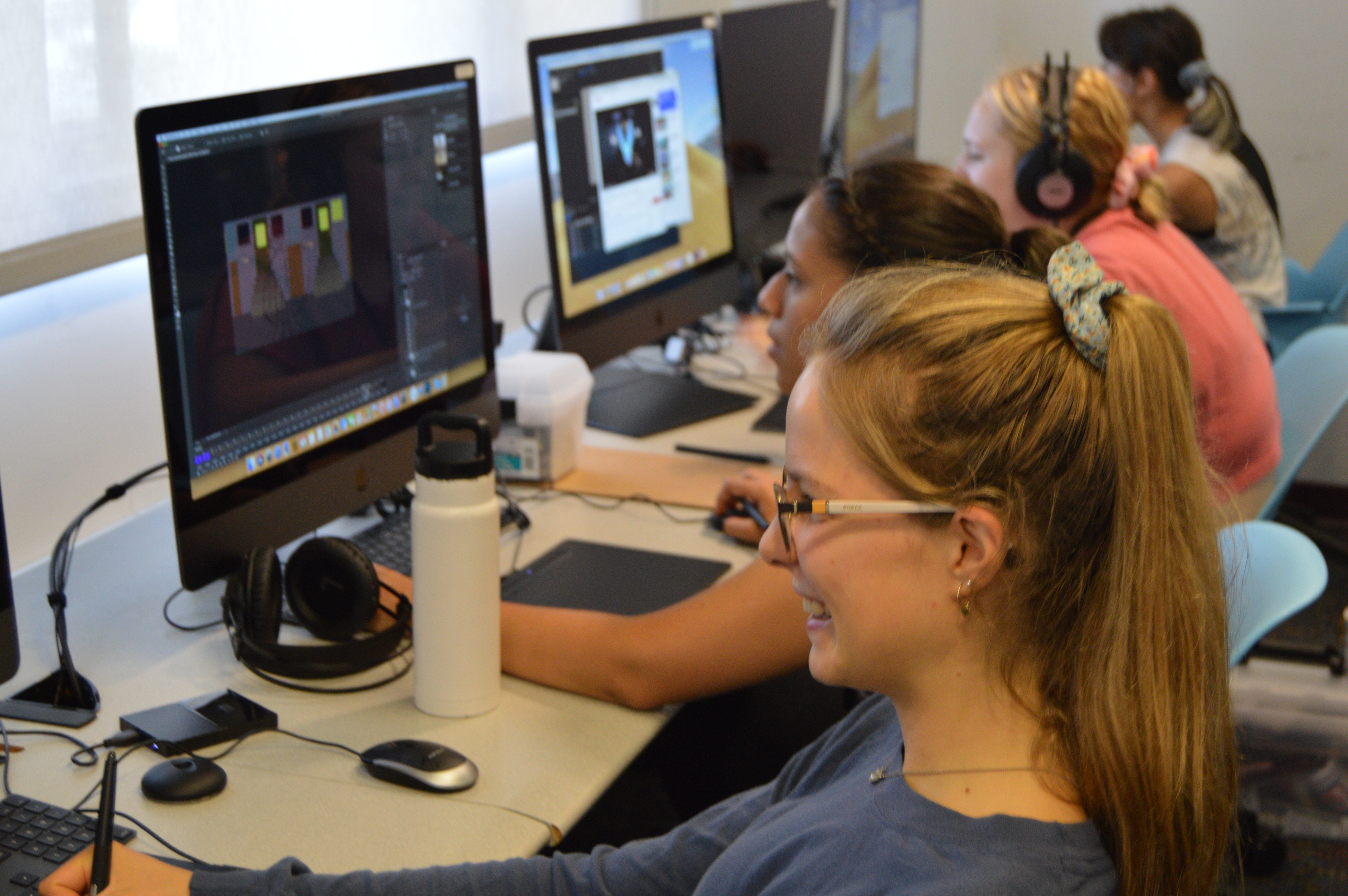Students working on digital projects