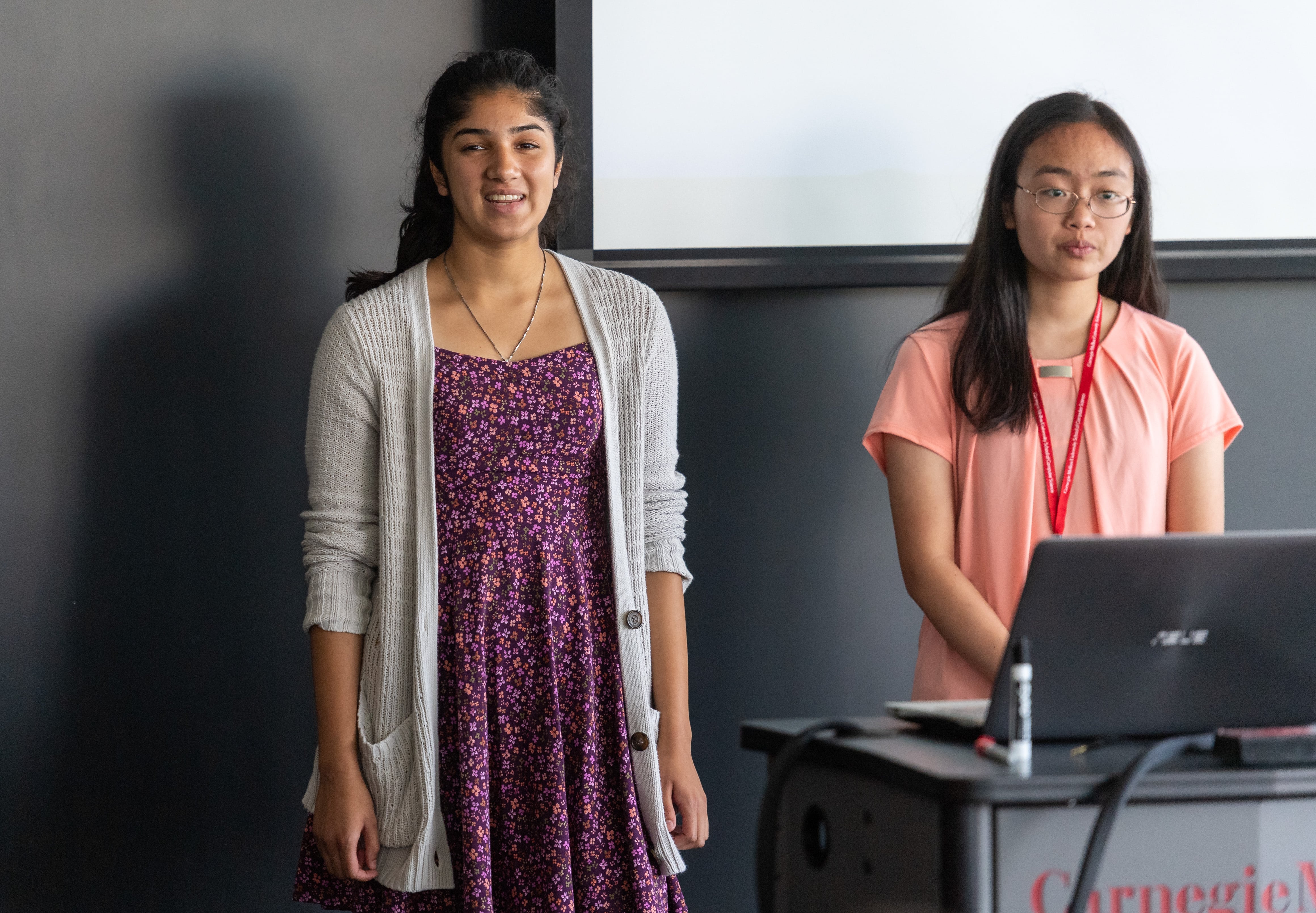 Pre-College AI students presenting.