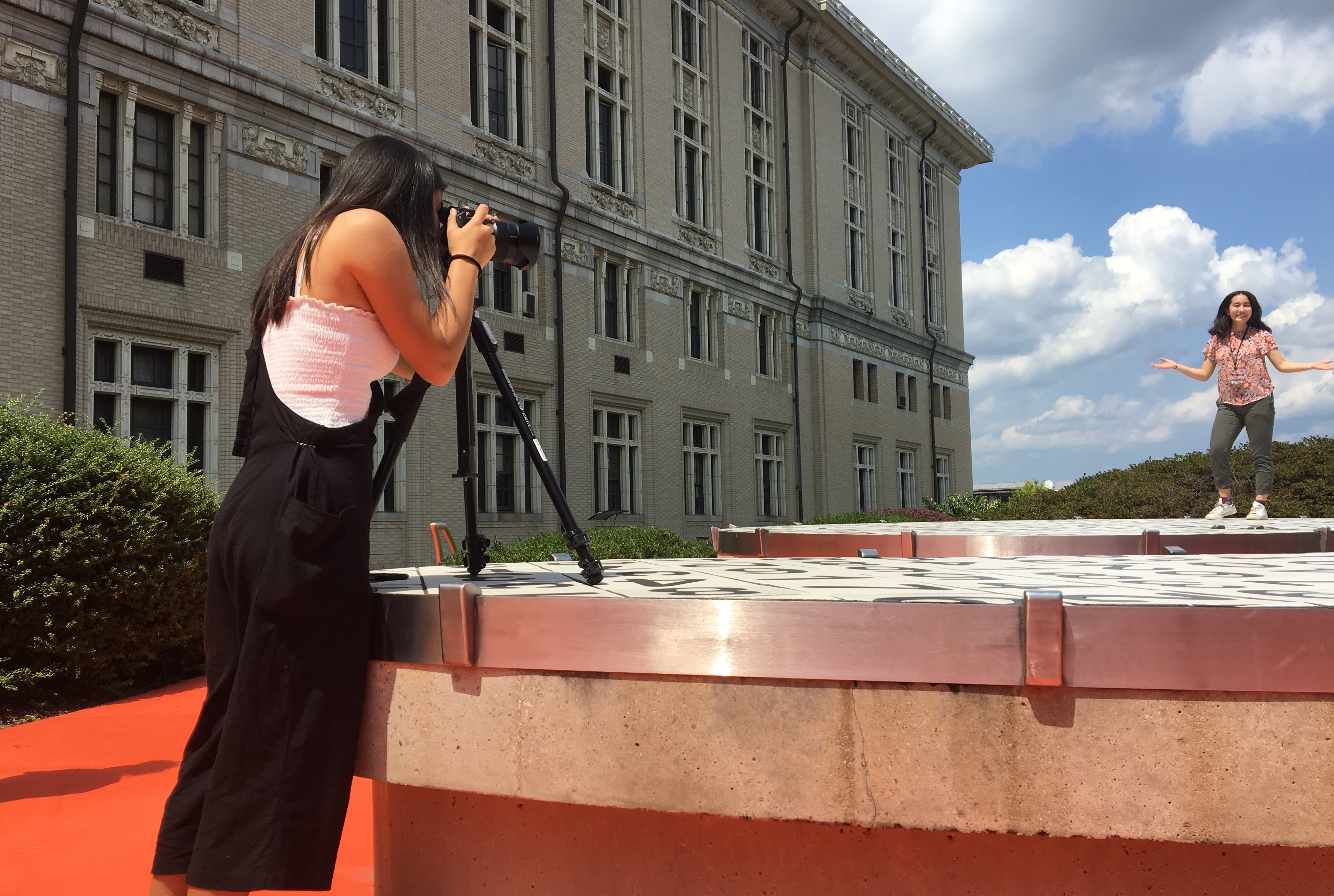 Pre-College Art students taking photo.