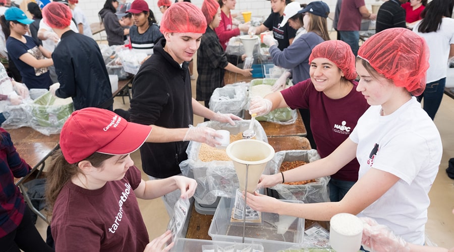CMU community packaged over 30,000 meals for families in need at the Rise Against Hunger event