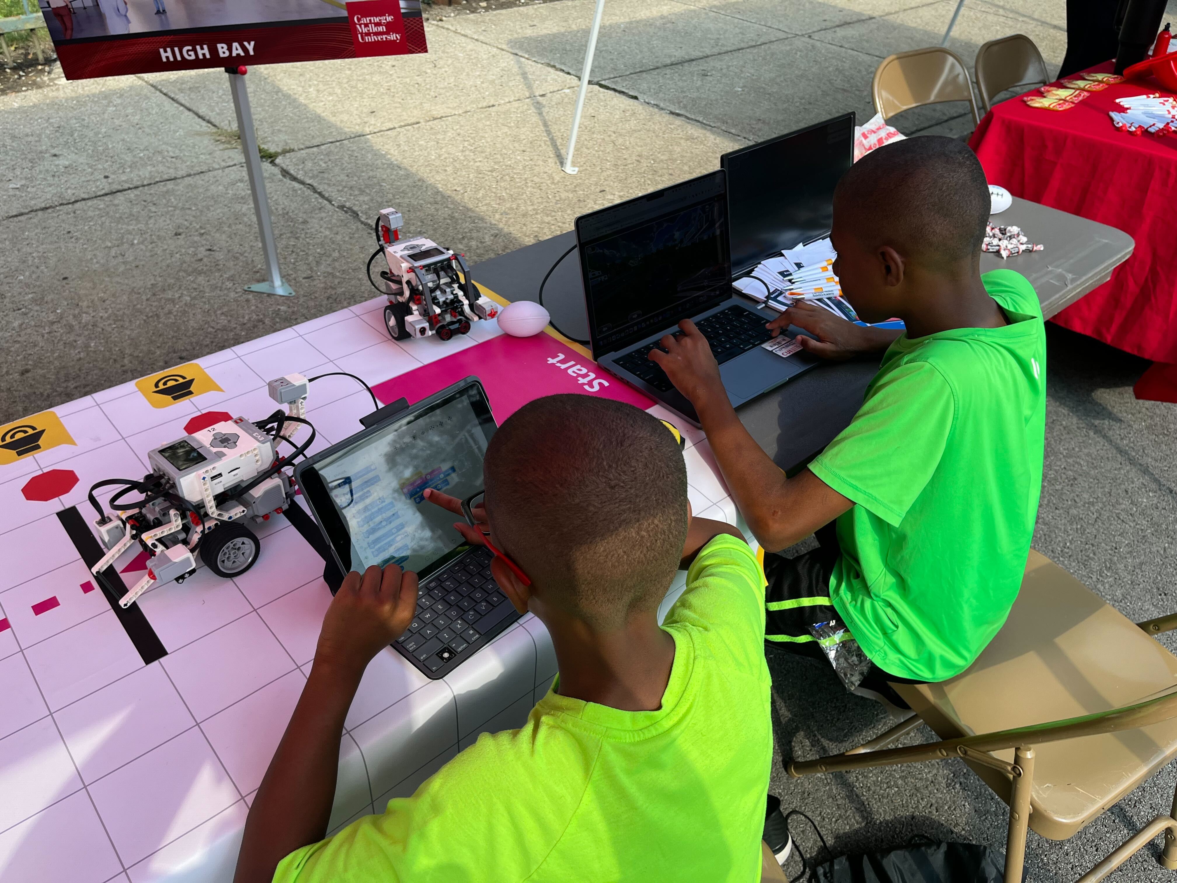 Kids playing games and with robots in Hazelwood