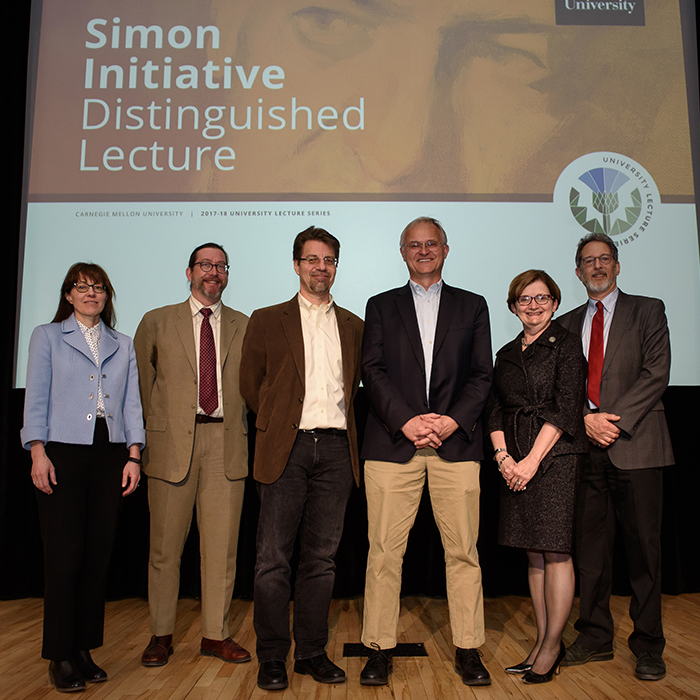 Bror Saxberg (third from right) stands with the Simon Initiative leadership team.
