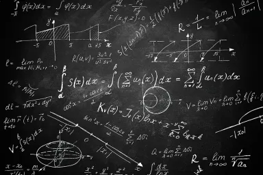 A chalkboard covered in equations.